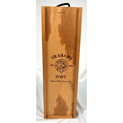726 - A 75cl bottle of W & J Graham's Port - More Than 40 Years of Age Tawny, in wooden presentation b... 