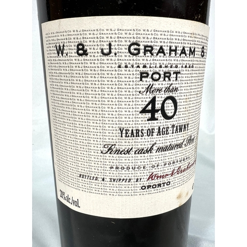 726 - A 75cl bottle of W & J Graham's Port - More Than 40 Years of Age Tawny, in wooden presentation b... 
