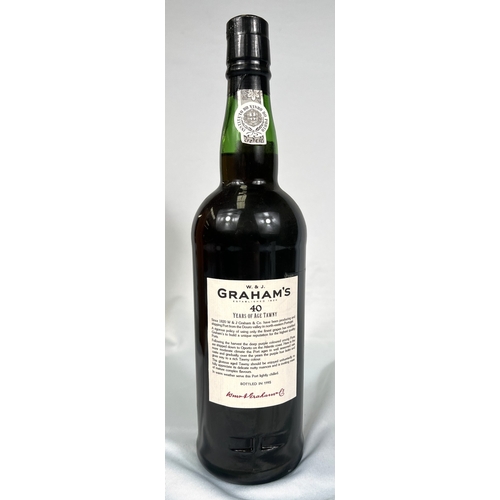726 - A 75cl bottle of W & J Graham's Port - More Than 40 Years of Age Tawny, in wooden presentation b... 