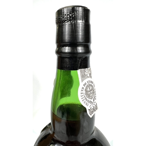 726 - A 75cl bottle of W & J Graham's Port - More Than 40 Years of Age Tawny, in wooden presentation b... 
