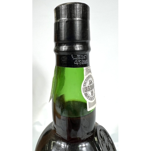 726 - A 75cl bottle of W & J Graham's Port - More Than 40 Years of Age Tawny, in wooden presentation b... 