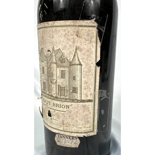 730 - A bottle of Chateau Haut Brion Premier Cru 1975 (label torn)