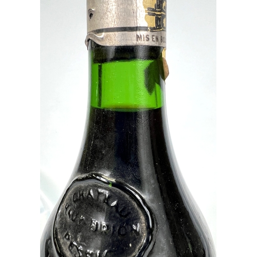 730 - A bottle of Chateau Haut Brion Premier Cru 1975 (label torn)