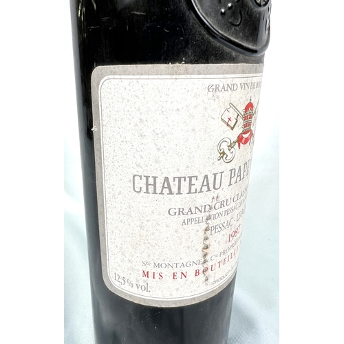 731 - A bottle of Chateau Pape Clement Grand Cru Classe de Graves Pessac-Leognan 1987