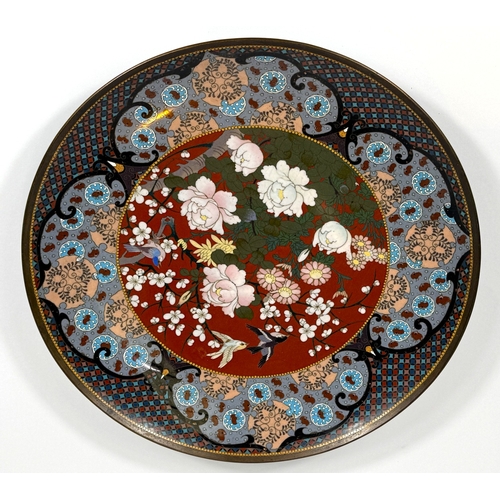 548 - A 19th century Japanese cloisonné dish decorated with birds and flowers in colour enamels, 30cm