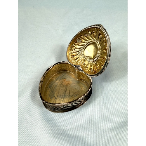 673 - A hallmarked silver heart-shaped trinket box with hinged lid, 1898, Birmingham, 57gms
