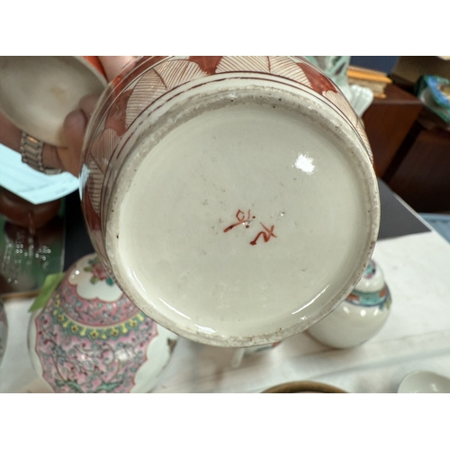 541 - A pair of Japanese Kutani porcelain ginger jars with gilding over ironed decoration, 16cm