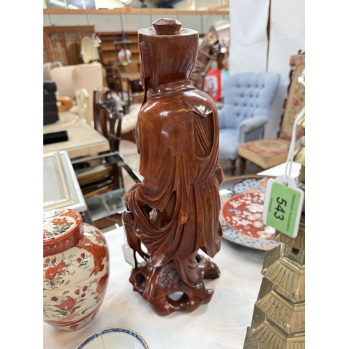 542 - A Chinese 19th century carved hardwood figure of a mendicant, 37cm