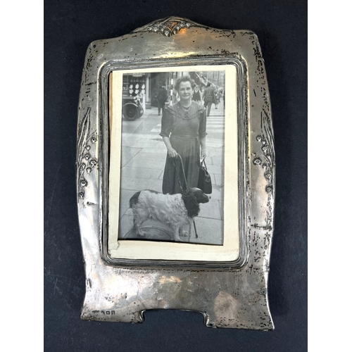647 - A hallmarked silver Art Nouveau frame and Viners cutlery, boxed.