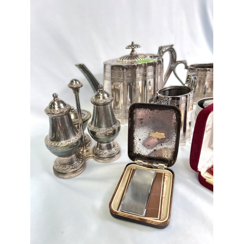 666 - A Victorian silver plated 3 piece tea set and other silver plate; a collection of cigarette lighters... 