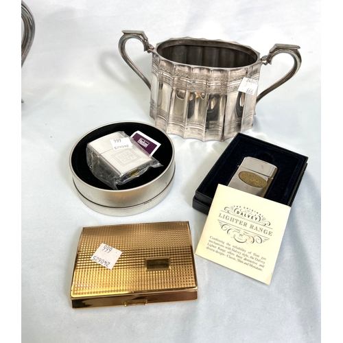 666 - A Victorian silver plated 3 piece tea set and other silver plate; a collection of cigarette lighters... 