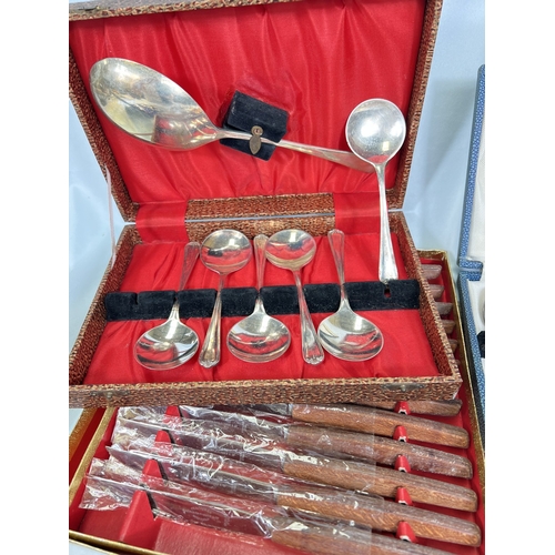 669 - A collection of boxed and loose cutlery etc.
