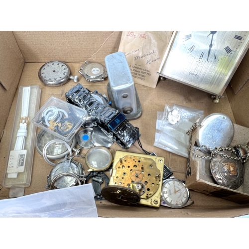 703 - A collection of vintage watch parts etc
