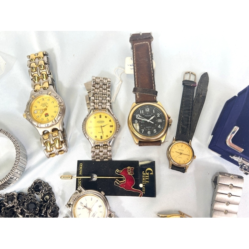 704 - A collection of watches, costume beads etc