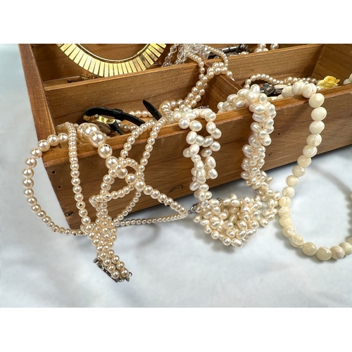 708 - A collection of costume jewellery pearls etc