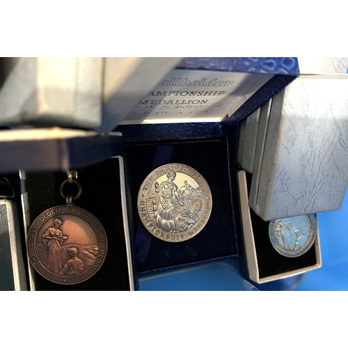 709 - A collection of silver plated trophy cups and bronze and other medals for Gardening and cooking etc