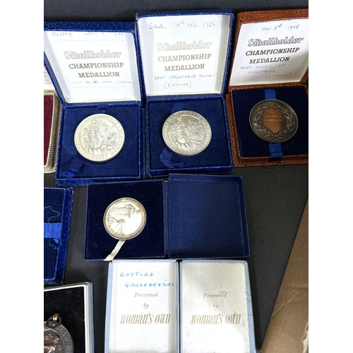 710 - A collection of post war bronze and other small hold and Gardening medals