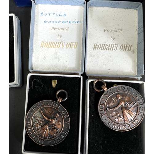 710 - A collection of post war bronze and other small hold and Gardening medals