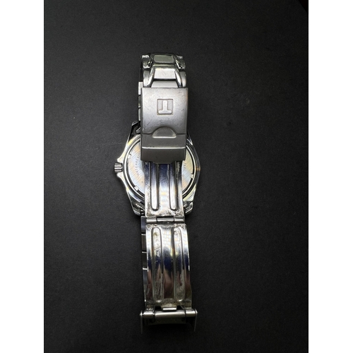 714 - A Seiko gents wristwatch and a Tissot wristwatch and other gents watches etc