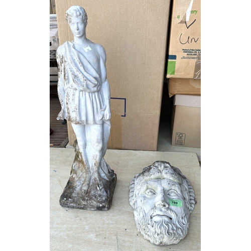 189 - A classical style stoneware wall hanging display head of Hercules and a composition figure and a lar... 