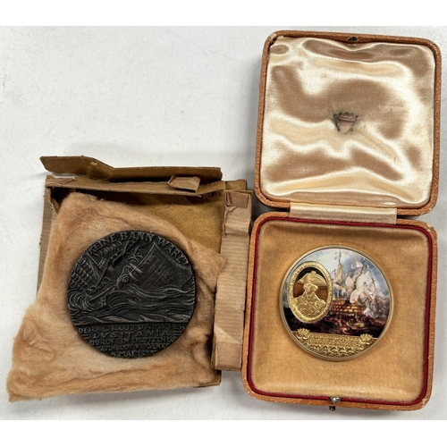 202B - A medal commemorating the sinking of the Lusitania and a HMS Victory coin