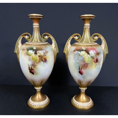 529 - Royal Worcester, a pair of hand painted vases, ovoid with double handles and pedestal, roses on ivor... 