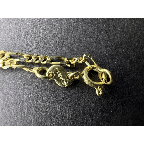 715A - A yellow metal dolphin pendant on necklace, dolphin stamped 585 and necklace stamped Midas 14K gross... 