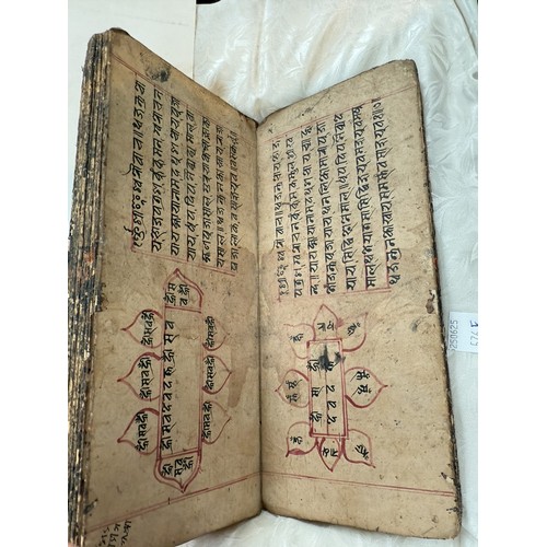 557F - An unusual 18th/19th century handwritten prayer/astrological book in fold out format in presentation... 