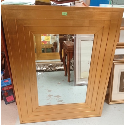 749 - A large gilt framed wall mirror with stepped frame, 75 x 50cm