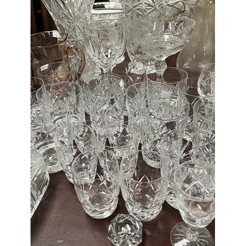 532 - A Dartington decanter, a pair of modern cut glass decanters, brandy glasses, whisky tumblers etc.