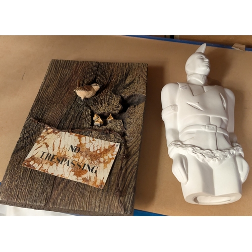 185 - An Art Deco brass desk lamp, pair of Indian clubs and a stylised figure of a chained man.No bids sol... 