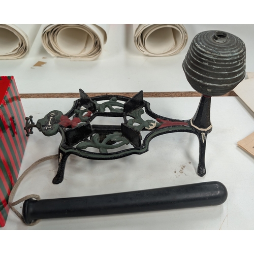 202A - A rubber Truncheon with rope grip possibly military and a Victorian painted burner stove with brass ... 