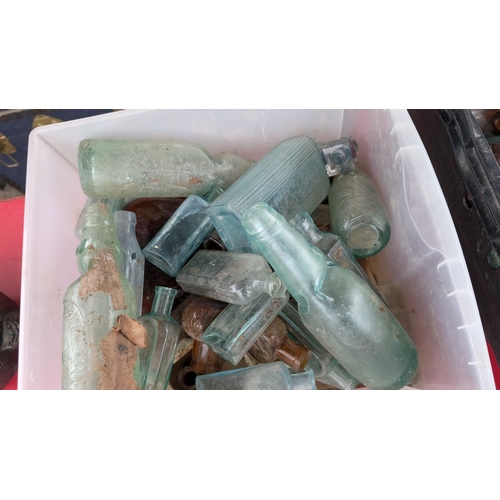 205A - A large collection of vintage advertising, Chemist and other bottles etc