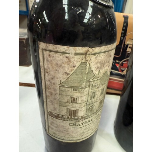 730A - A bottle of Chateau Haut Brion Premier Cru 1975