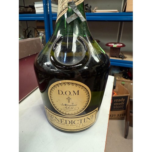 737 - A bottle of 'Benedictine' liqueur; a boxed 1 litre bottle of 'Drambuie' liqueur