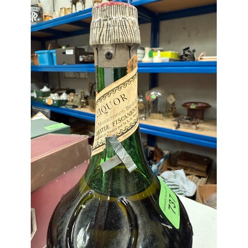 737 - A bottle of 'Benedictine' liqueur; a boxed 1 litre bottle of 'Drambuie' liqueur