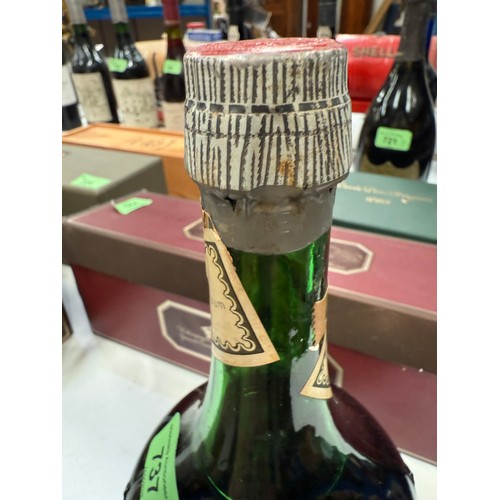 737 - A bottle of 'Benedictine' liqueur; a boxed 1 litre bottle of 'Drambuie' liqueur
