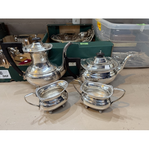 627 - A 19th century EPNS circular tray, 37cm, a Georgian style 4 piece tea service, 2 swing handled cake ... 