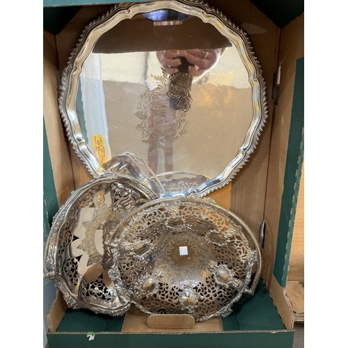627 - A 19th century EPNS circular tray, 37cm, a Georgian style 4 piece tea service, 2 swing handled cake ... 