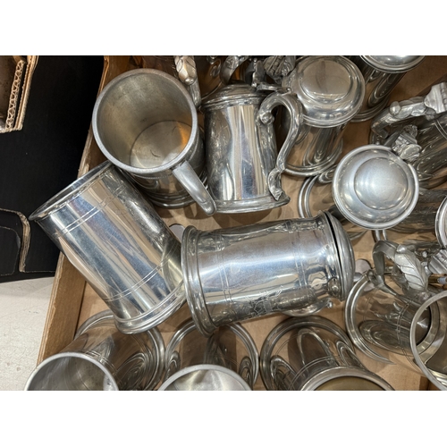 719 - A large collection of silver plate one pint mugs - approximately 20.