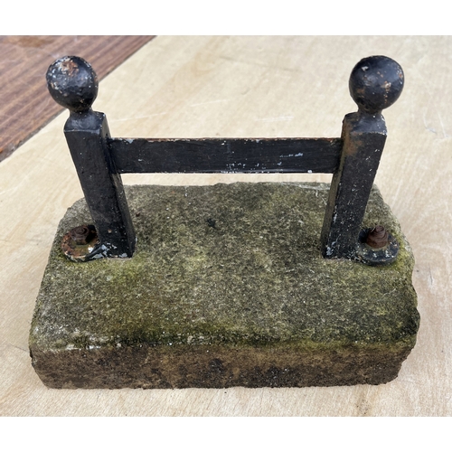 187 - A vintage cast iron door stop in the form of a riding boot; a boot scraper.