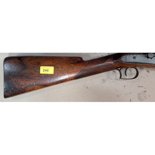 A 19th century walnut stocked percussion rifle by James Wilkinson with ...