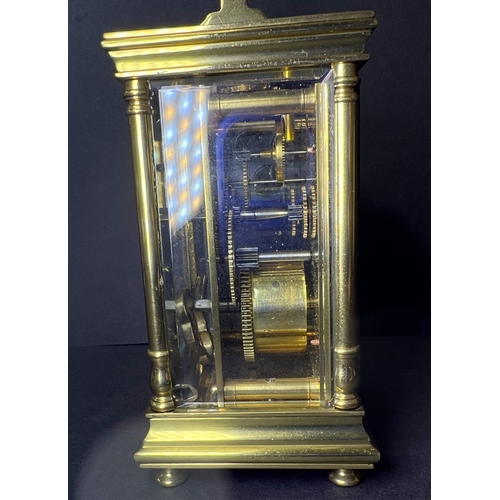 27 - A brass carriage clock with white dial and timepiece movement, height 13cm; 2 small cloisonnee ashtr... 