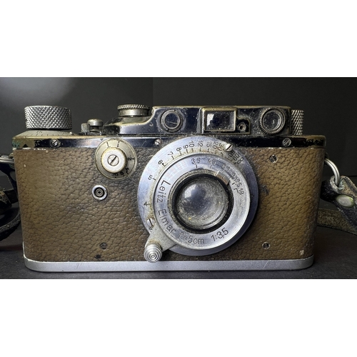 4 - A LEICA 35mm camera with 50mm lens and 35mm lens, serial number. 654440 (poor condition)NB: descript... 