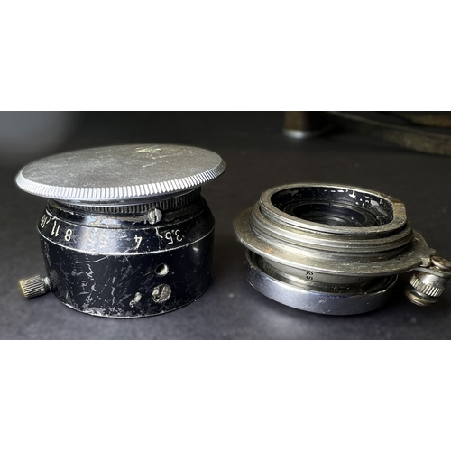 4 - A LEICA 35mm camera with 50mm lens and 35mm lens, serial number. 654440 (poor condition)NB: descript... 