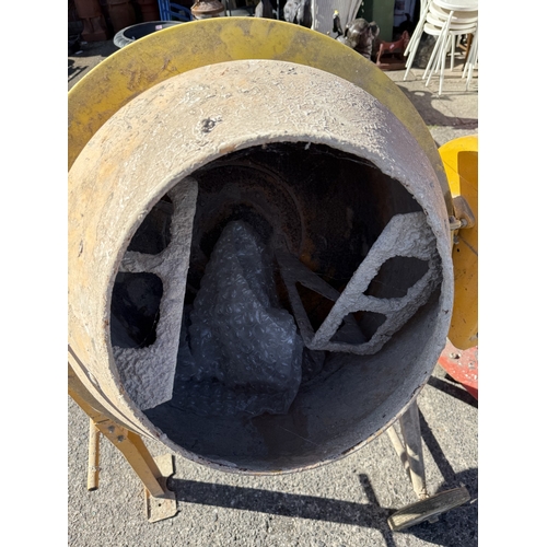 61 - A Clarke CCM125C 250v concrete mixer and a Clarke strong arm device.