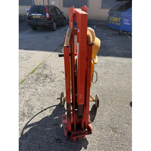61 - A Clarke CCM125C 250v concrete mixer and a Clarke strong arm device.