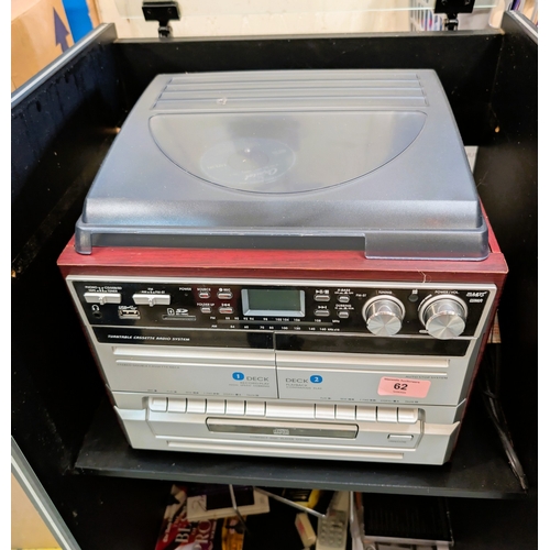 62 - A turntable cassette radio system with speakers.