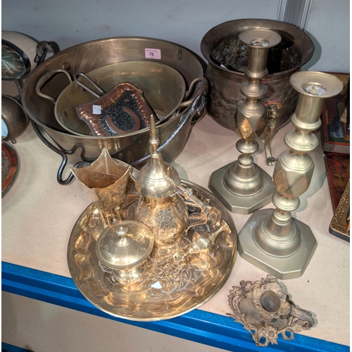 70 - A large brass jam pan, a pair of brass candle sticks and another jam pan etc.