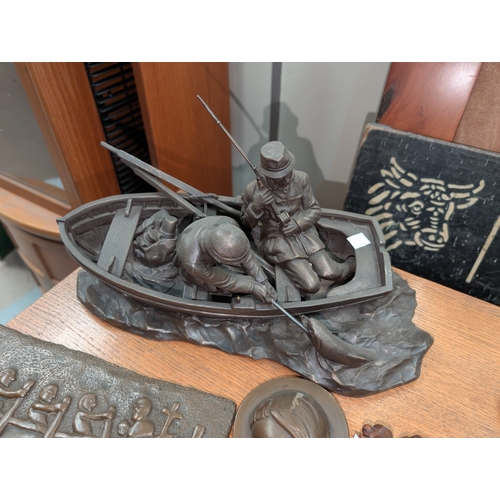 74 - An Irish club, wooden figure and other small collectables.